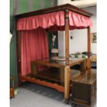 A Mahogany Four Poster Bed, with reeded supports, 154cm by 196cm by 247cm