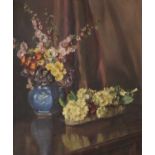 Follower of Herbert Davis Richter (1874-1955)Still life of assorted blooms in a blue vase on a