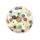 A Bohemian Scrambled Paperweight, 2nd half of the 19th century, with various silhouette and floral