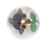 A Baccarat Pansy Miniature Paperweight, circa 1850, worked with a single flower on a leafy stem,