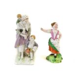 A Berlin Porcelain Figure Group, of a mother and her two children, painted in colored enamels,