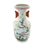A Chinese Porcelain Twin-Handled Vase, Qianlong mark but not of the period, painted in famille