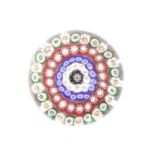 A Baccarat Miniature Paperweight, circa 1850, with concentric canes6cm diameterNo chips or cracks.