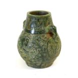 A Chinese Jade-Type Vase, in Archaic style, of baluster form with elephant mask handles, carved with