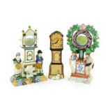 A Yorkshire Prattware Pocket Watch Stand, circa 1820, modelled in the form of a longcase clock,