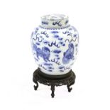 A Chinese Porcelain Ginger Jar and Cover, Kangxi mark but 19th century, painted in underglaze blue