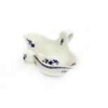 A Tournai Porcelain Two-Handled Sauceboat, circa 1770, painted in underglaze blue with flower sprigs