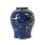A Chinese Porcelain Baluster Vase, Kangxi, powder blue ground and gilded with a continuing landscape