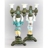 A Pair of Majolica Figural Twin-Light Candelabra, circa 1870, in the Chinoiserie style formed as a