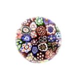 A Baccarat Close Millefiori Miniature Paperweight, circa 1850, worked with multiple canes5cm