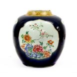 A Chinese Porcelain Ginger Jar, Qianlong, blue ground and painted in famille rose enamels within