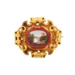 A Victorian Micro Mosaic Brooch the oval red jasper plaque inset to depict the Villa d'Gregorian