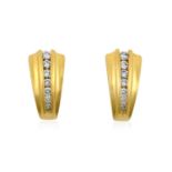 A Pair of 18 Carat Gold Diamond Earringsa row of graduated round brilliant cut diamonds in a