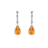 A Pair of Citrine and Diamond Drop Earringsa trio of round brilliant cut diamonds suspends a tapered