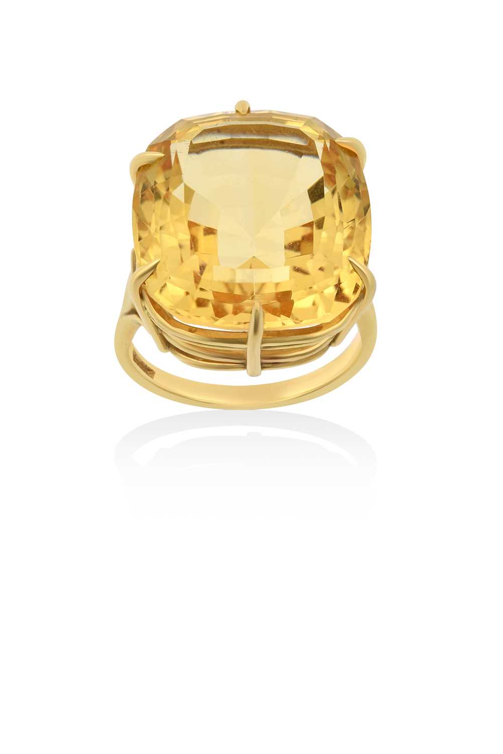 An 18 Carat Gold Citrine Solitaire Ringthe cushion shaped citrine in a yellow claw setting, to a