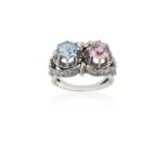 An 18 Carat White Gold Pink Tourmaline, Aquamarine and Diamond Ringthe round cut pink tourmaline and