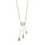 An Aquamarine and Seed Pearl Necklacethe oval cut aquamarine suspends three graduated knife edge