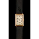 An Art Deco 9 Carat Gold Rectangular Wristwatch, 1935, manual wound lever movement, silvered dial