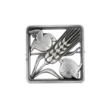 A Silver Brooch, by Georg Jensenthe square frame with a wheatsheaf diagonally and a bird in each