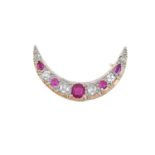 A Synthetic Ruby and Diamond Broochthe crescent motif set throughout with graduated synthetic rubies