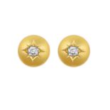 A Pair of Diamond Solitaire Earringsthe yellow domes inset with an old cut diamond, in star