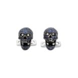 A Pair of 18 Carat Gold Blue Stone and Diamond Skull Cufflinksthe skull motif pavé set throughout