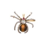 A Diamond, Synthetic Ruby and Tiger's-Eye Broochrealistically modelled as a spider, the body