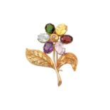 A Multi-Gem Set Broochrealistically modelled as a flower, the central yellow dome inset with an