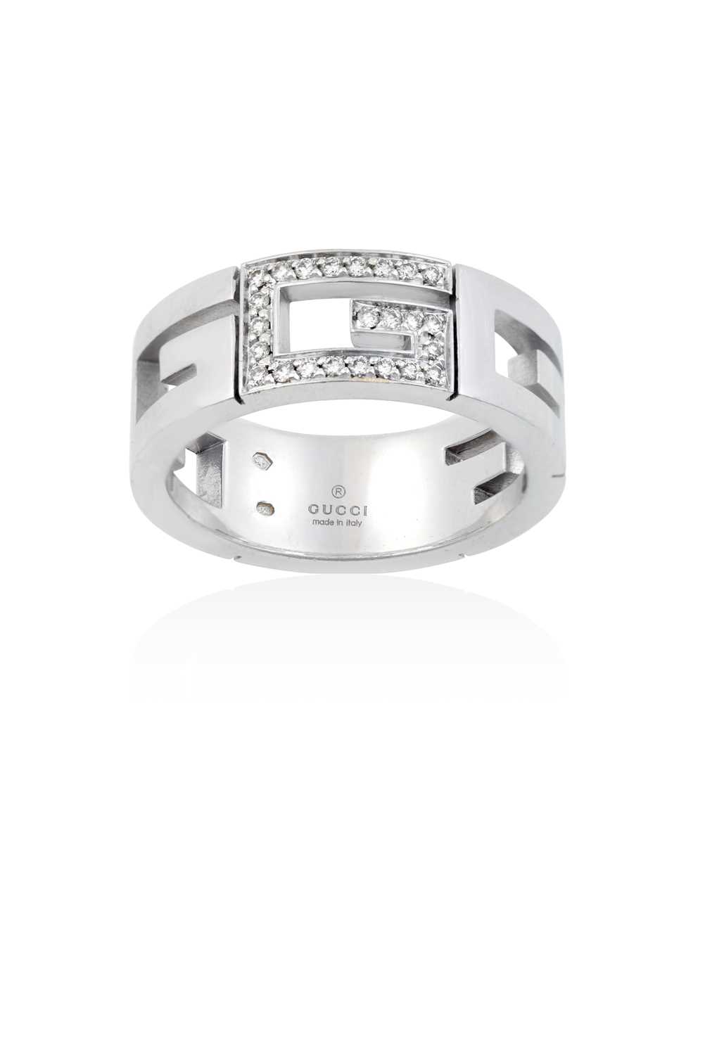 A Diamond Ring, by Guccithe central G motif set throughout with round brilliant cut diamonds, in