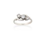 A Diamond Three Stone Twist Ringthe graduated round brilliant cut diamonds in white double claw