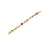 A Citrine, Amethyst and Blue Topaz Braceletthe oval cut citrine, amethyst and blue topaz in yellow