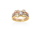 An 18 Carat Tri-Coloured Gold Diamond Cluster Ringnine vari-sized old cut diamonds laid upon a