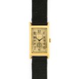 An Art Deco 14 Carat Gold Curved Rectangular Wristwatch, circa 1930, manual wound lever movement,