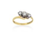 An 18 Carat Gold Diamond Three Stone Twist Ringthe graduated round brilliant cut diamonds, in