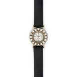 Omega: A Lady's 18 Carat White Gold Diamond Set Back Winding Wristwatch, signed Omega, circa 1968,