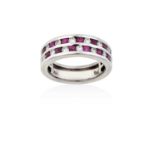 A Ruby and Diamond Ring two rows formed of step cut rubies alternating with round brilliant cut