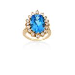 A Blue Topaz and Diamond Cluster Ringthe oval blue topaz within a border of round brilliant cut