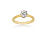 A Diamond Solitaire Ringthe old cut diamond in a white claw setting, to a yellow tapered shoulder
