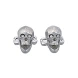 A Pair of 18 Carat White Gold Diamond Skull Cufflinksthe textured skull motif with articulated