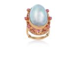 A Mother-of-Pearl and Synthetic Ruby Cluster Ringthe oval domed mother-of-pearl in a yellow rubbed