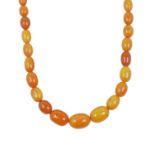 An Amber Bead Necklacecomprising of fifty-five graduated amber beadslength 80cmThe necklace is in