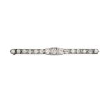 A Diamond Bar Brooch the tapered bar set throughout with old cut diamonds, in white claw and
