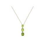 A Peridot and Diamond Necklacethree graduated cushion cut peridot in yellow claw settings, spaced by