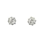 A Pair of Diamond Solitaire Earringsthe old cut diamonds in white claw settings, total estimated