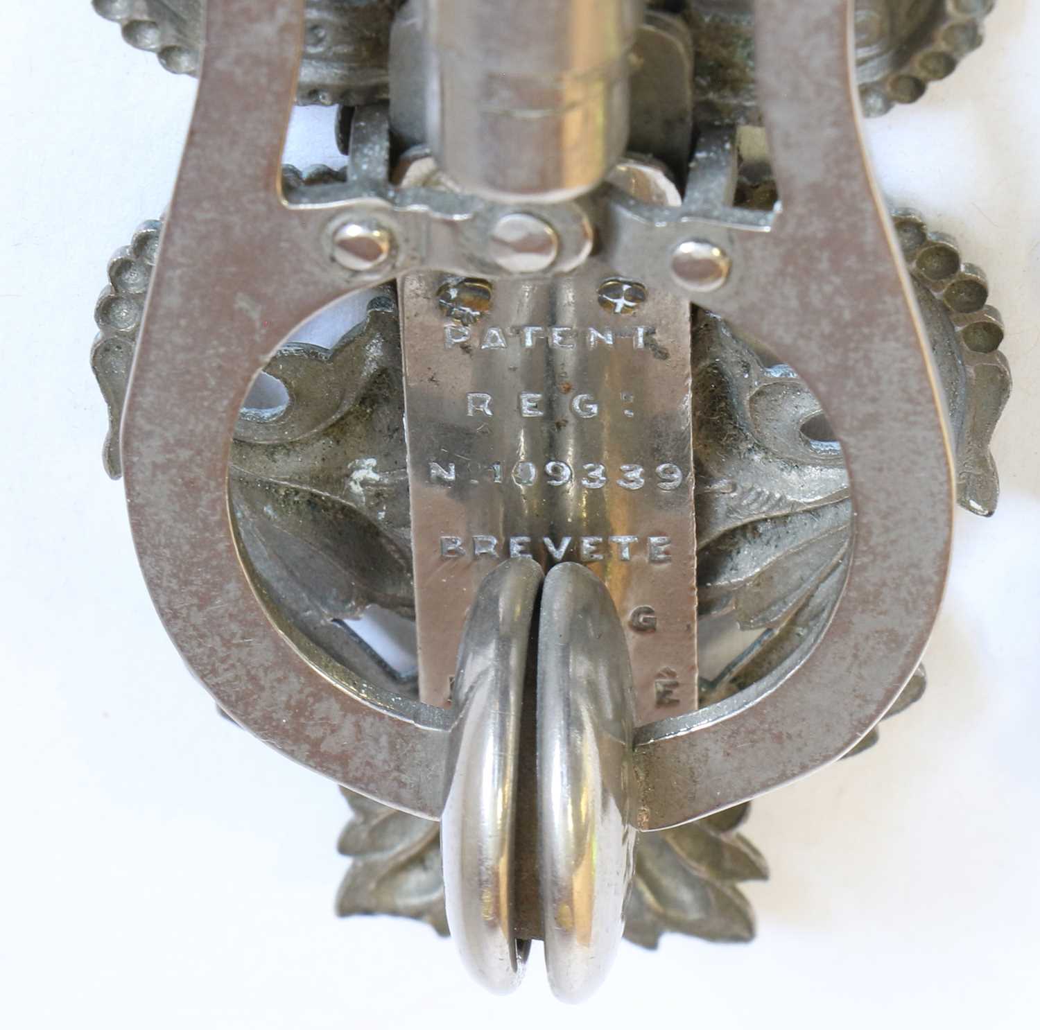 An Unusual Decorative Pierced Plated Skirt Lifter, Fyfe's Patent comprising two hinged decorative - Image 3 of 7
