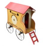 An Imperial Bathing Machine Possibly Lines Bros, yellow painted wooden construction, red