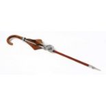 Hermés Shooting Stick with curved wooden handle, light tan leather seat, stamped in gilt to the