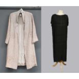 Circa 1920s Black Crepe Short Sleeve Evening Dress with slash neck, black appliqué beads in
