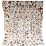 An Early 19th Century Cotton Coverlet, comprising a central square enclosing a small sampler to