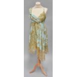 Circa 1990s Christian Lacroix Pale Blue Chiffon and Gold Lace Woven Cocktail Dress, with an empire